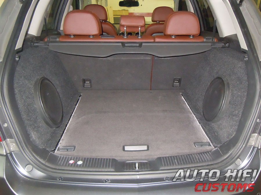 Установка сабвуфера Alpine SWR-1043D в Opel Antara