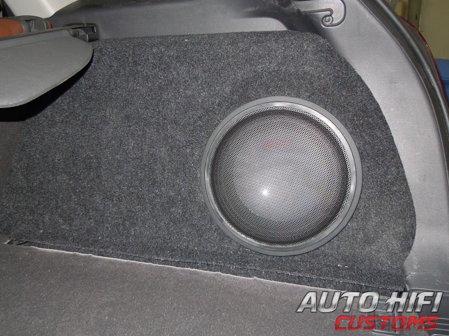 Установка сабвуфера Alpine SWR-1043D в Opel